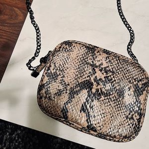 Armani exchange snakeskin crossbody bag.